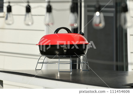 Small mini grill barbecue on the table 111454606