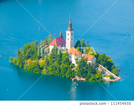 Aerial view of island with church in the middle of Bled lake, Slovenia Aerial view of island with church in the middle of Bled lake, Slovenia 111454938