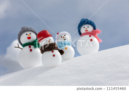 Snow slope and snowman family Snow slope and snowman family 111455460