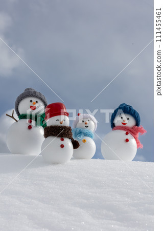 Snow slope and snowman family Snow slope and snowman family 111455461