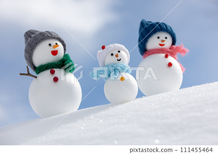 Snow slope and snowman family Snow slope and snowman family 111455464