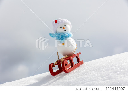 Snowman sledding Snowman sledding 111455607