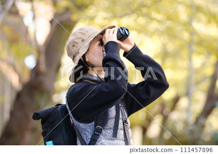 Hiking, mountain walking, binoculars 111457896