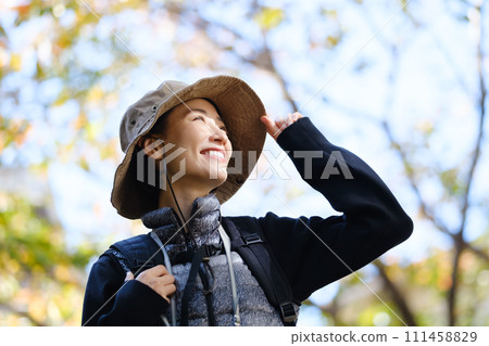 Hiking, mountain walking, looking up at clear skies Hiking, mountain walking, looking up at clear skies 111458829