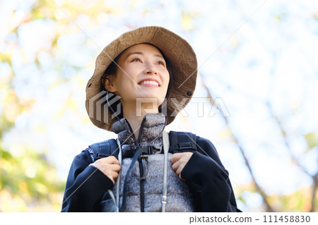 Hiking, mountain walking, looking up at clear skies Hiking, mountain walking, looking up at clear skies 111458830