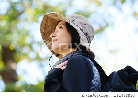 Hiking, mountain walking, looking up at clear skies 111458836