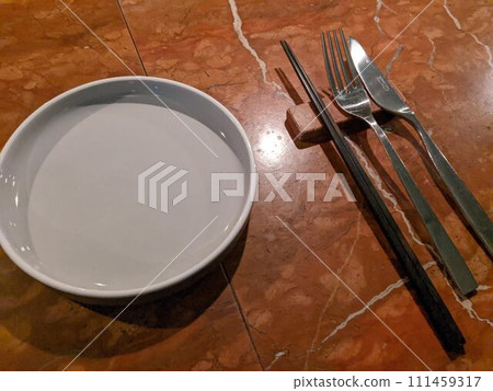 White dish and cutlery White dish and cutlery 111459317