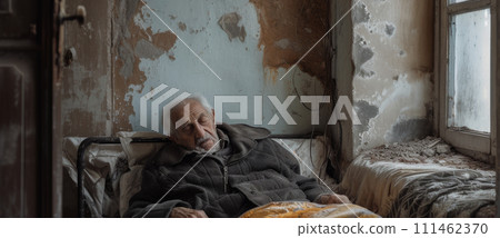 Aging Society old man lying on bed in abandonment nursing home waiting for final days. 111462370