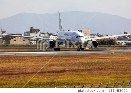 [Osaka Prefecture_Osaka International Airport] B777 waiting for takeoff 111465021