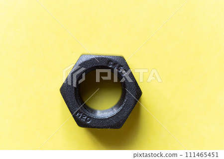 Nuts on yellow background 111465451