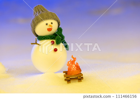 Snowman at night 111466156