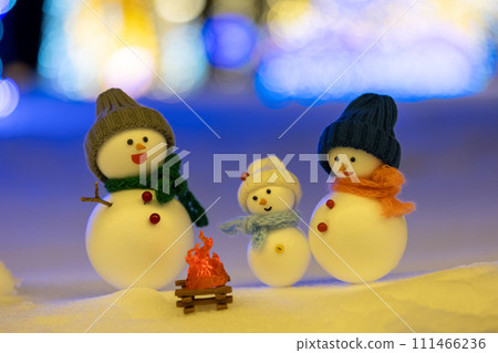 Snowman family at night Snowman family at night 111466236