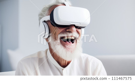 Portrait of a happy smiling enthusiastic elderly old, senior wearing a virtual reality headset in a white room. 111467575