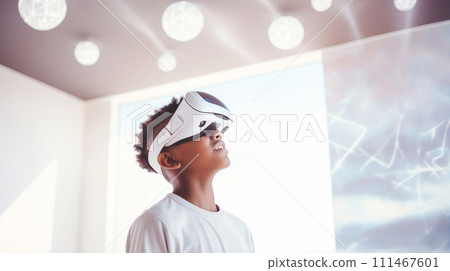 Portrait of happy smiling enthusiastic african american dark skinned curly boy child person wearing virtual reality headset in white room. Portrait of happy smiling enthusiastic african american dark skinned curly boy child person wearing virtual reality headset in white room. 111467601