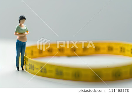 A woman who is disappointed with a measuring tape on her stomach -5 (3D) A woman who is disappointed with a measuring tape on her stomach -5 (3D) 111468378