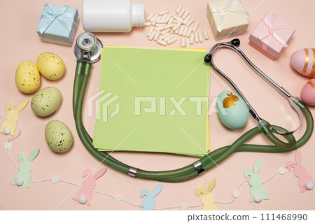 Medical Easter mockup on a beige background, blank with space for text, top view. Medical Easter mockup on a beige background, blank with space for text, top view. 111468990