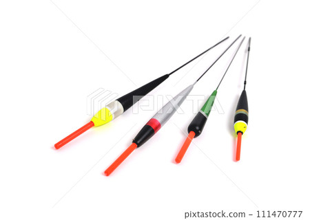 fishing floats of different shapes and colors on a white background close-up, copy space fishing floats of different shapes and colors on a white background close-up, copy space 111470777