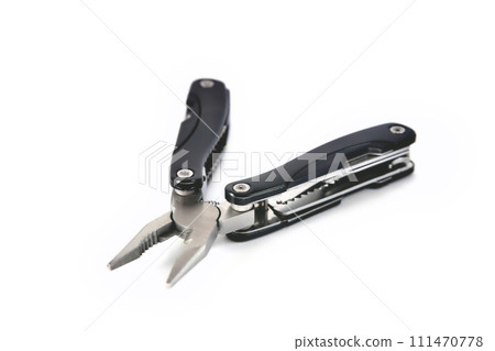 multi tool black on a white background close-up multi tool black on a white background close-up 111470778