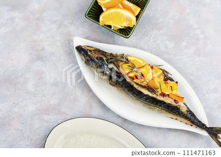 Roasted mackerel fish with oranges. Roasted mackerel fish with oranges. 111471163