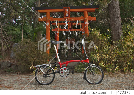 red bicycle in front of torii gate red bicycle in front of torii gate 111472372