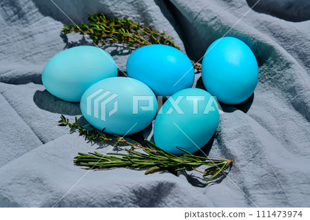 Easter composition in blue shades. Painted eggs on a blue background. Easter composition in blue shades. Painted eggs on a blue background. 111473974