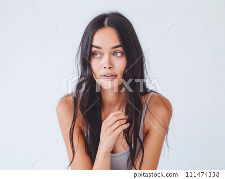 Close up portrait of a happy young woman isolated from a white background copy space for text. 111474338
