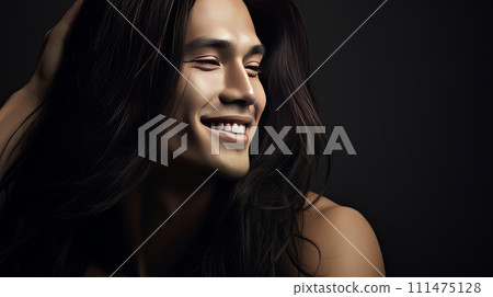 Elegant handsome smiling young Asian man with long hair, on silver, banner, copy space, portrait. 111475128