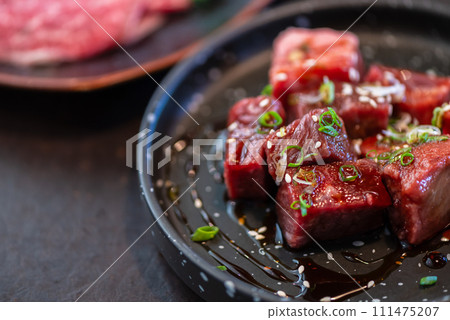 Diced Wagyu beef on dish. Premium Japanese meat 111475207