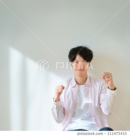 Young men playing guts pose Young men playing guts pose 111475415