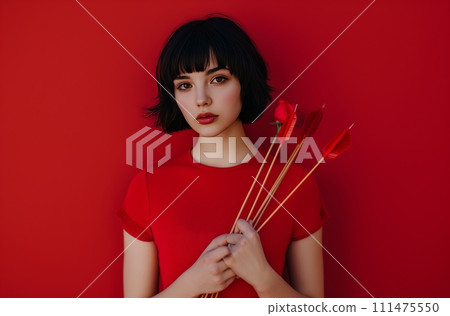 AI-generated content. A young woman with short black hair is dressed in red and holds what appear to be Cupid's arrows 111475550