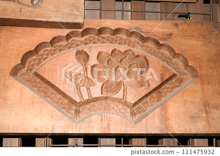 Wooden mold of an Edo rakugan carved from a 100-year-old tree. A wooden mold for sweets from a Japanese sweets shop in a townhouse that has been around since the Edo period in Morioka City, Iwate Prefecture. 111475932