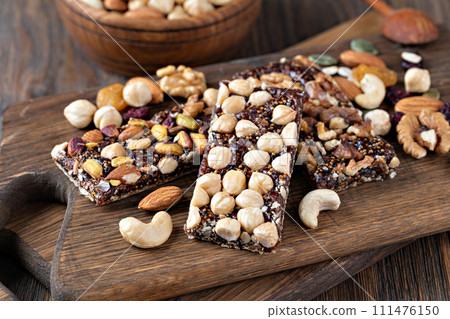 Granola bar on wooden background 111476150