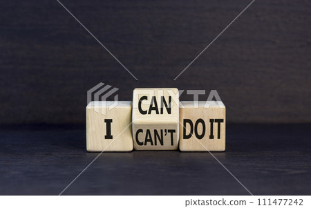 I can do it symbol. Concept word I can or can not do it on beautiful wooden cubes. Beautiful black table black background. Business and i can or not do it concept. Copy space. I can do it symbol. Concept word I can or can not do it on beautiful wooden cubes. Beautiful black table black background. Business and i can or not do it concept. Copy space. 111477242