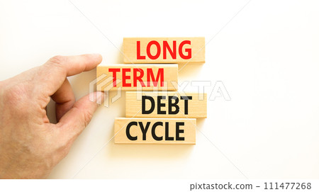 Long term debt cycle symbol. Concept words Long term debt cycle on beautiful wooden block. Beautiful white table white background. Businessman hand. Business Long term debt cycle concept. Copy space. Long term debt cycle symbol. Concept words Long term debt cycle on beautiful wooden block. Beautiful white table white background. Businessman hand. Business Long term debt cycle concept. Copy space. 111477268