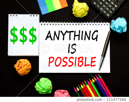 Anything is possible symbol. Concept words Anything is possible on beautiful white note. Beautiful black background. Black pen. Calculator. Business anything possible concept. Copy space. Anything is possible symbol. Concept words Anything is possible on beautiful white note. Beautiful black background. Black pen. Calculator. Business anything possible concept. Copy space. 111477398