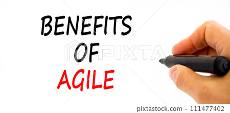 Benefits of agile symbol. Concept words Benefits of agile on beautiful white paper. Beautiful white table white background. Businessman hand. Business benefits of agile concept. Copy space. Benefits of agile symbol. Concept words Benefits of agile on beautiful white paper. Beautiful white table white background. Businessman hand. Business benefits of agile concept. Copy space. 111477402