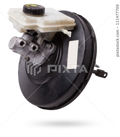 Black metal vacuum brake booster for repair and replacement on a car in a workshop on a white isolated background. Spare parts catalog for cars. 111477709