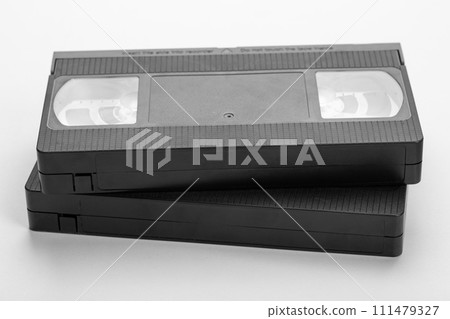 Two videotapes VHS on white background. 111479327