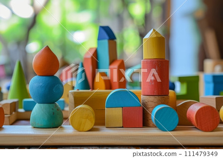 A variety of natural wooden children's toys on the shelves , children's playroom 111479349