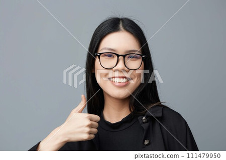 Woman attractive background portrait asian face glasses smile business cute fashion beautiful student studio 111479950