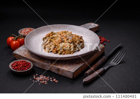 Delicious boiled beef or pork tongue sliced with carrots, onions, sour cream and spices 111480481