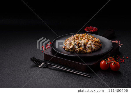 Delicious boiled beef or pork tongue sliced with carrots, onions, sour cream and spices Delicious boiled beef or pork tongue sliced with carrots, onions, sour cream and spices 111480496