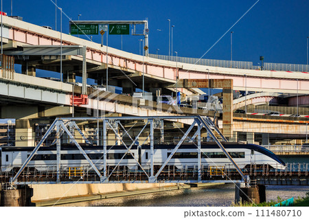 Keisei Skyliner and Horikiri Junction crossing the Ayase River 111480710