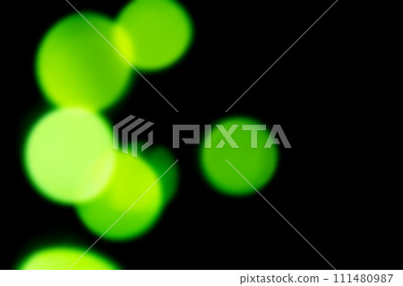 黑色背景上閃閃發光的綠色圖像背景材料 黑色背景上閃閃發光的綠色圖像背景材料 111480987