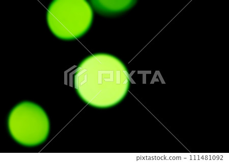 黑色背景上閃閃發光的綠色圖像背景材料 111481092