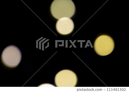 Sparkling yellow color image on black background background material Sparkling yellow color image on black background background material 111481302