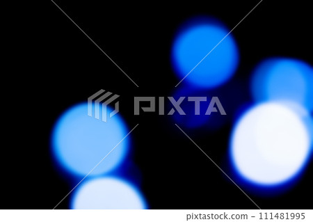 黑色背景上閃閃發光的藍色圖像背景材料 111481995