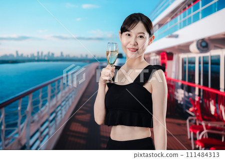 Young woman having fun on a cruise ship 111484313