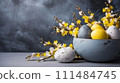 Easter Bowl with Eggs and Yellow Flowers, serene Easter composition with a bowl of eggs surrounded by vibrant yellow winter jasmine on a moody grey background. Banner with copy space 111484745