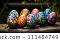 Artistic Easter Eggs on Rustic Wood. A vivid array of hand-painted Easter eggs on a rural wooden surface, showcasing folk art. Easter spring decoration 111484749